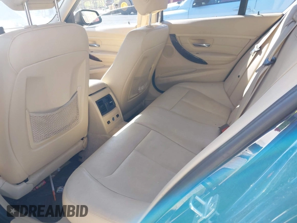 2013 BMW 3 Series 328i xDrive with VIN WBA3B3G54DNR80235, listed as a IAAI auction lot 42105883 with 144,023 mi miles. Bid and sale history available at carsss.com. Image 8.