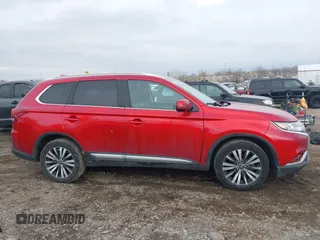 2020 Mitsubishi Outlander ES z VIN JA4AZ3A38LZ020558, wystawiony jako IAAI lot #41694744 z przebiegiem 100 886 mil mil oraz . Historia ofert i sprzedaży dostępna na DreamBid. Obrazek 13.