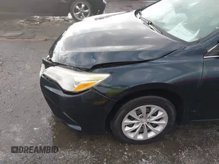 2015 Toyota Camry XLE with VIN 4T1BF1FK4FU043212, listed as a IAAI auction lot 41706573 with 170,074 mi miles and . Bid and sale history available at DreamBid. Image 18.