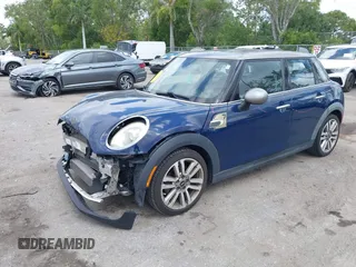 2017 MINI Hardtop 4 Door Cooper with VIN WMWXU1C54H2E19114, listed as a IAAI auction lot 42107266 with 83,524 mi miles and . Bid and sale history available at DreamBid. Image 18.