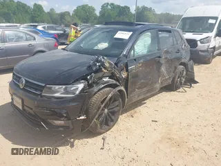 2021 Volkswagen Tiguan SE z VIN 3VV3B7AX5MM027369, wystawiony jako IAAI lot #42082821 z przebiegiem 74 024 mil mil oraz . Historia ofert i sprzedaży dostępna na DreamBid. Obrazek 4.