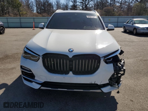 2020 BMW X5 xDrive40i with VIN 5UXCR6C09L9C13127, listed as a Copart auction lot 53941035 with 76,685 mi miles and Salvage title. Bid and sale history available at DreamBid. Image 5.