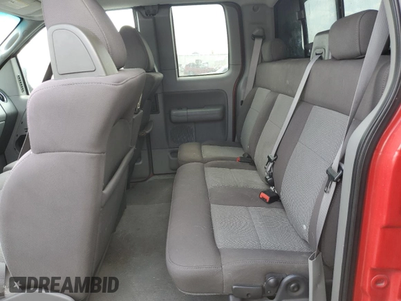 2004 Ford F-150 STX with VIN 1FTRX02W44KB96118, listed as a Copart auction lot 71984374 with 146,820 mi miles and Salvage title. Bid and sale history available at DreamBid. Image 10.
