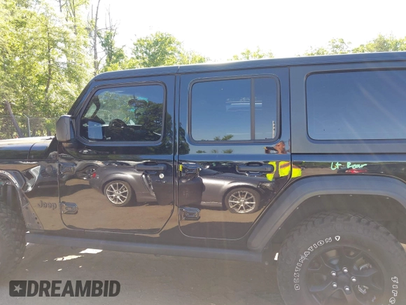 2021 Jeep Wrangler Unlimited Sport S with VIN 1C4HJXDNXMW646194, listed as a IAAI auction lot 42243169 with 44,237 mi miles and . Bid and sale history available at DreamBid. Image 14.