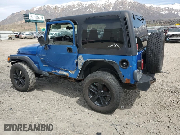 2002 Jeep Wrangler Sport with VIN 1J4FA49S32P762794, listed as a Copart auction lot 52132955 with 243,499 mi miles and Salvage Title. Bid and sale history available at carsss.com. Image 2.