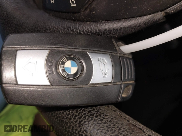 2010 BMW 5 Series 528i xDrive with VIN WBANV1C52AC157577, listed as a IAAI auction lot 41945678 with 153,379 mi miles and . Bid and sale history available at carsss.com. Image 11.