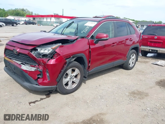 2019 Toyota RAV4 XLE with VIN JTMP1RFV2KD021348, listed as a IAAI auction lot 42198925 with 130,838 mi miles and . Bid and sale history available at DreamBid. Image 2.