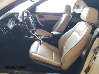 2012 BMW 1 Series 128i with VIN WBAUN1C5XCVH84372, listed as a Copart auction lot 54162815 with 127,420 mi miles and Clean title. Bid and sale history available at DreamBid. Image 7.