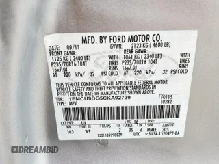 2012 Ford Escape XLT z VIN 1FMCU9DG5CKA92739, wystawiony jako Copart lot #62380375 z przebiegiem 68 755 mil mil oraz Szkoda całkowita • Salvage title. Historia ofert i sprzedaży dostępna na DreamBid. Obrazek 13.