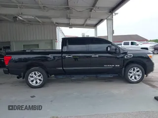 2020 Nissan Titan Platinum Reserve with VIN 1N6AA1FB3LN503641, listed as a IAAI auction lot 42395997 with 177,362 mi miles and . Bid and sale history available at DreamBid. Image 13.