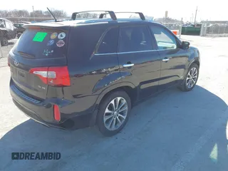 2015 Kia Sorento SX with VIN 5XYKWDA70FG565779, listed as a IAAI auction lot 41675010 with 134,060 mi miles. Bid and sale history available at carsss.com. Image 4.