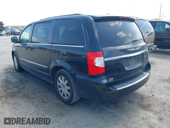 2016 Chrysler Town & Country Touring with VIN 2C4RC1BG8GR297243, listed as a IAAI auction lot 42143705 with 140,728 mi miles. Bid and sale history available at carsss.com. Image 3.