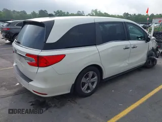 2019 Honda Odyssey EX-L with VIN 5FNRL6H70KB083596, listed as a IAAI auction lot 42072667 with 153,087 mi miles and . Bid and sale history available at DreamBid. Image 4.