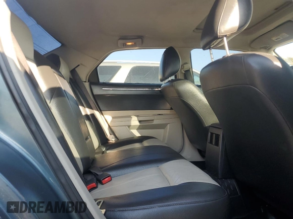 2005 Chrysler 300 with VIN 2C3JA53GX5H563815, listed as a Copart auction lot 81886344 with 144,630 mi miles and Salvage Title. Bid and sale history available at carsss.com. Image 10.