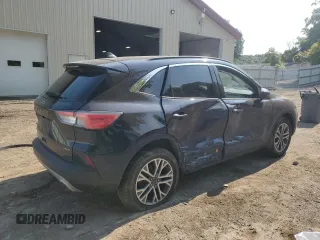 2021 Ford Escape SEL Hybrid z VIN 1FMCU9CZ7MUA94260, wystawiony jako Copart lot #71013514 z przebiegiem Nie podano mil oraz Szkoda całkowita • Salvage title. Historia ofert i sprzedaży dostępna na DreamBid. Obrazek 3.