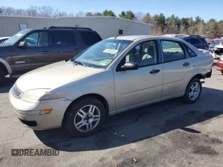 2007 Ford Focus S z VIN 1FAFP34N87W201011, wystawiony jako Copart lot #51569545 z przebiegiem 162 139 mil mil oraz Nie do naprawy • Non repairable. Historia ofert i sprzedaży dostępna na DreamBid. Obrazek 1.