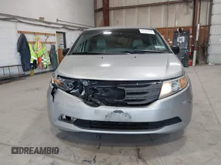 2012 Honda Odyssey EX z VIN 5FNRL5H47CB045705, wystawiony jako IAAI lot #42384430 z przebiegiem 157 598 mil mil oraz . Historia ofert i sprzedaży dostępna na DreamBid. Obrazek 12.