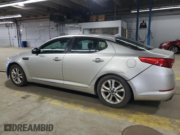 2011 Kia Optima EX with VIN KNAGN4A70B5071155, listed as a Copart auction lot 52201275 with 206,675 mi miles and Salvage Title. Bid and sale history available at carsss.com. Image 2.