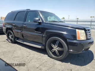2002 Cadillac Escalade z VIN 1GYEC63T42R189976, wystawiony jako Copart lot #57852565 z przebiegiem 243 089 mil mil oraz Szkody całkowita. Historia ofert i sprzedaży dostępna na DreamBid. Obrazek 4.