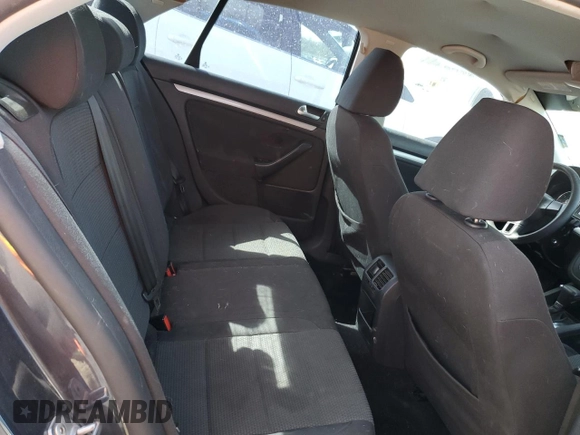 2010 Volkswagen Jetta S with VIN 3VWJX7AJ0AM010958, listed as a Copart auction lot 51334955 with 178,684 mi miles and Salvage title. Bid and sale history available at DreamBid. Image 11.
