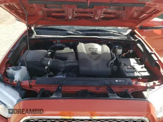 2017 Toyota Tacoma SR5 z VIN 3TMCZ5AN1HM096157, wystawiony jako Copart lot #74628764 z przebiegiem 91 998 mil mil oraz Szkoda całkowita • Salvage title. Historia ofert i sprzedaży dostępna na DreamBid. Obrazek 12.