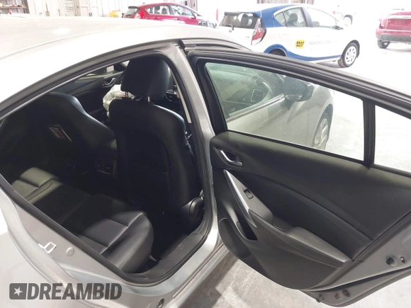 2014 Mazda 6 i Touring with VIN JM1GJ1T51E1106970, listed as a IAAI auction lot 42027350 with 113,756 mi miles and . Bid and sale history available at DreamBid. Image 8.