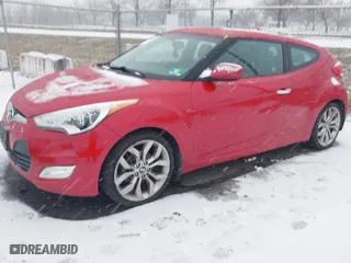 2014 Hyundai Veloster with VIN KMHTC6AD8EU214612, listed as a IAAI auction lot 41258820 with 61,984 mi miles. Bid and sale history available at carsss.com. Image 17.