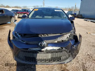 2021 Toyota Corolla LE with VIN JTDEPMAE5MJ129080, listed as a Copart auction lot 86690424 with 56,201 mi miles and Clean Title. Bid and sale history available at carsss.com. Image 5.