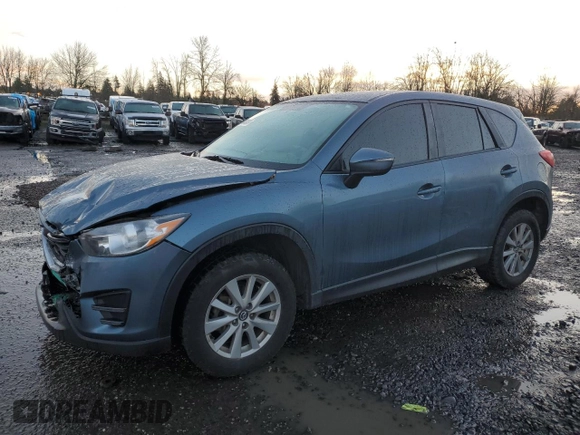 2016 Mazda CX-5 Sport with VIN JM3KE4BY3G0876082, listed as a Copart auction lot 86438024 with 203,544 mi miles and Salvage Title. Bid and sale history available at carsss.com. Image 1.
