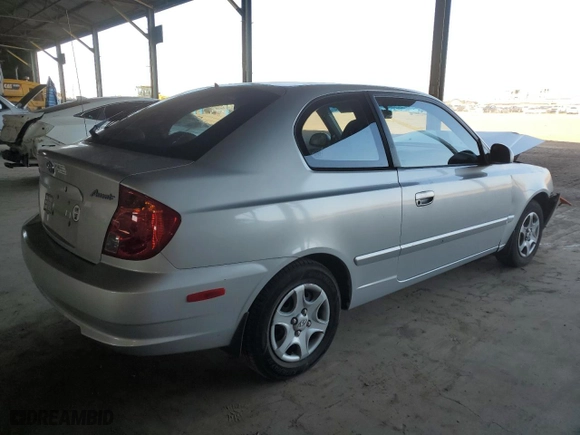 2004 Hyundai Accent GL with VIN KMHCG35CX4U283952, listed as a Copart auction lot 73587124 with 41,742 mi miles and Salvage Title. Bid and sale history available at carsss.com. Image 3.