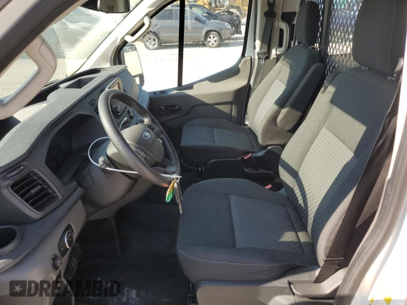2023 Ford Transit Cargo with VIN 1FTBR1Y83PKA55264, listed as a Copart auction lot 56707125 with 14,737 mi miles and Clean title. Bid and sale history available at DreamBid. Image 7.
