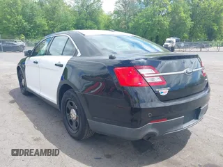 2014 Ford Police Interceptor with VIN 1FAHP2MKXEG185863, listed as a IAAI auction lot 42297860 with 115,188 mi miles and . Bid and sale history available at DreamBid. Image 3.