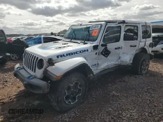 2023 Jeep Wrangler Rubicon z VIN 1C4JJXR67PW516493, wystawiony jako Copart lot #49143415 z przebiegiem 58 762 mil mil oraz Szkoda całkowita • Salvage title. Historia ofert i sprzedaży dostępna na DreamBid. Obrazek 1.