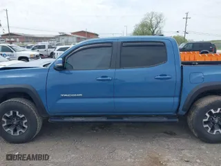 2019 Toyota Tacoma 4WD SR with VIN 3TMCZ5AN0KM260201, listed as a IAAI auction lot 42017048 with 49,216 mi miles. Bid and sale history available at carsss.com. Image 15.