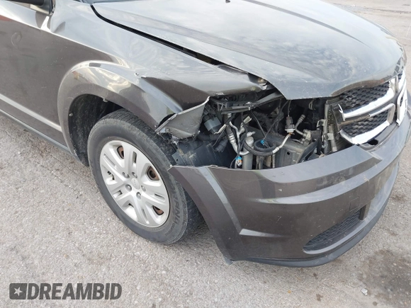 2018 Dodge Journey SE with VIN 3C4PDCABXJT170150, listed as a IAAI auction lot 40715756 with 113,330 mi miles and . Bid and sale history available at DreamBid. Image 6.