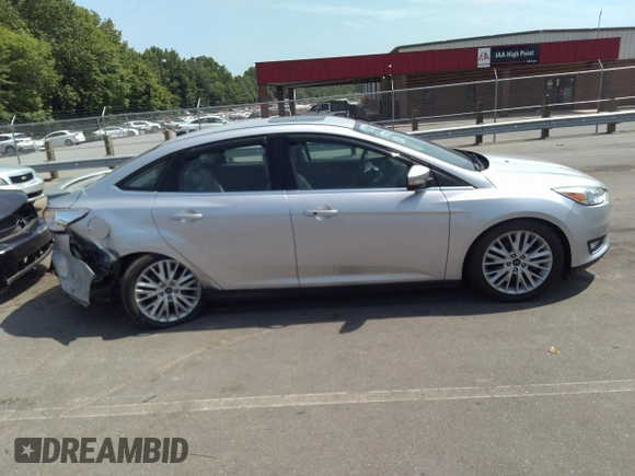2018 Ford Focus Titanium with VIN 1FADP3J26JL280723, listed as a IAAI auction lot 42319900 with 149,583 mi miles and . Bid and sale history available at DreamBid. Image 12.