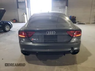 2015 Audi RS 7 z VIN WUAW2CFC5FN900592, wystawiony jako Copart lot #49462463 z przebiegiem 74 694 mil mil oraz . Historia ofert i sprzedaży dostępna na DreamBid. Obrazek 6.