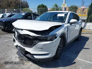 2018 Mazda CX-5 Grand Touring with VIN JM3KFADM8J0373368, listed as a IAAI auction lot 42013535 with 63,142 mi miles and . Bid and sale history available at DreamBid. Image 17.