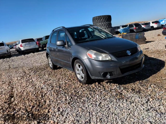 2012 Suzuki SX4 Crossover with VIN JS2YB5A31C6306926, listed as a Copart auction lot 79307604 with 131,762 mi miles and Salvage Title. Bid and sale history available at carsss.com. Image 13.