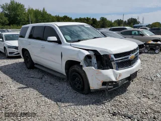 2016 Chevrolet Tahoe Commercial with VIN 1GNSKDEC9GR351547, listed as a Copart auction lot 70412524 with 130,010 mi miles and Clean Title. Bid and sale history available at carsss.com. Image 4.