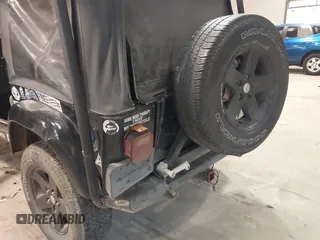 1999 Jeep Wrangler Sahara z VIN 1J4FY49S4XP432567, wystawiony jako IAAI lot #41562455 z przebiegiem Nie podano mil oraz . Historia ofert i sprzedaży dostępna na DreamBid. Obrazek 6.