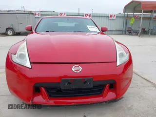 2009 Nissan 370Z Touring z VIN JN1AZ44E79M404171, wystawiony jako IAAI lot #41924058 z przebiegiem 75 940 mil mil oraz . Historia ofert i sprzedaży dostępna na DreamBid. Obrazek 12.