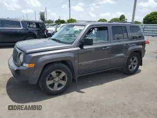 2014 Jeep Patriot High Altitude with VIN 1C4NJPFA2ED888925, listed as a Copart auction lot 60191435 with 122,308 mi miles and Salvage title. Bid and sale history available at DreamBid. Image 1.