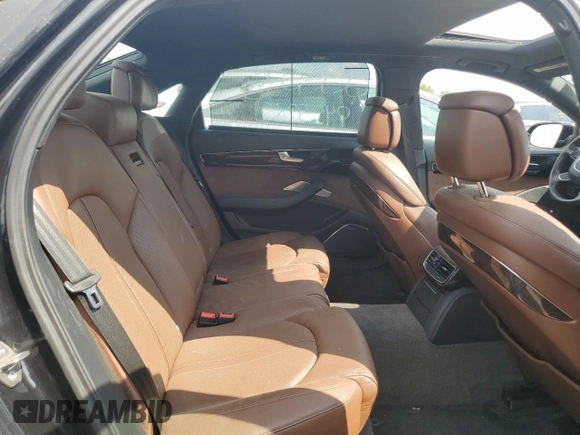 2011 Audi A8 z VIN WAURVAFD9BN005595, wystawiony jako Copart lot #66302644 z przebiegiem 106 610 mil mil oraz Nie do naprawy. Historia ofert i sprzedaży dostępna na DreamBid. Obrazek 10.