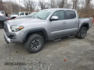 2018 Toyota Tacoma SR z VIN 3TMCZ5AN2JM122416, wystawiony jako Copart lot #61351225 z przebiegiem Nie podano mil oraz Szkoda całkowita • Salvage title. Historia ofert i sprzedaży dostępna na DreamBid. Obrazek 1.