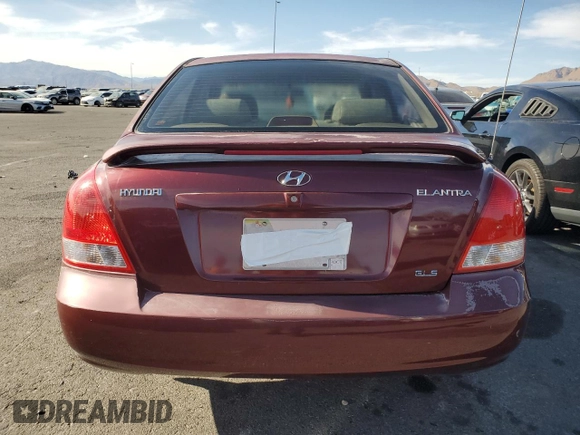 2001 Hyundai Elantra GLS z VIN KMHDN45D41U107399, wystawiony jako Copart lot #52658745 z przebiegiem 65 459 mil mil oraz Szkoda całkowita • Salvage title. Historia ofert i sprzedaży dostępna na DreamBid. Obrazek 6.