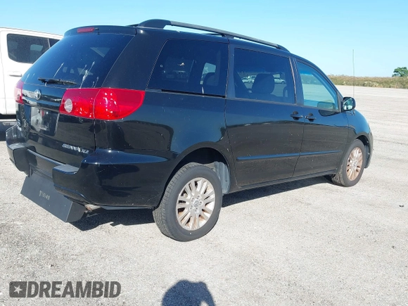 2009 Toyota Sienna XLE with VIN 5TDZK22C59S235573, listed as a IAAI auction lot 40885143 with 62,949 mi miles. Bid and sale history available at carsss.com. Image 4.
