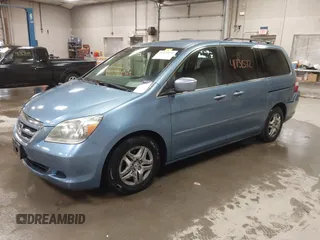 2006 Honda Odyssey EX with VIN 5FNRL38466B123206, listed as a IAAI auction lot 41731572 with 110,792 mi miles. Bid and sale history available at carsss.com. Image 2.