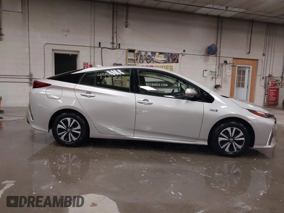2017 Toyota Prius Plus z VIN JTDKARFP1H3044307, wystawiony jako IAAI lot #41440321 z przebiegiem 40 512 mil mil oraz . Historia ofert i sprzedaży dostępna na DreamBid. Obrazek 14.