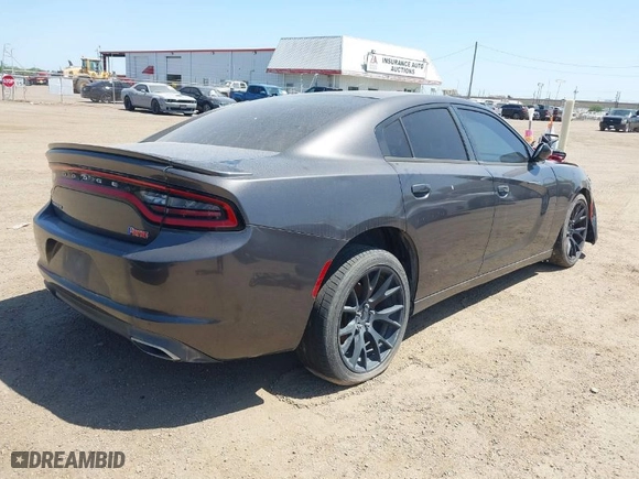 2016 Dodge Charger SE with VIN 2C3CDXBG1GH174724, listed as a IAAI auction lot 42019643 with 81,300 mi miles. Bid and sale history available at carsss.com. Image 4.